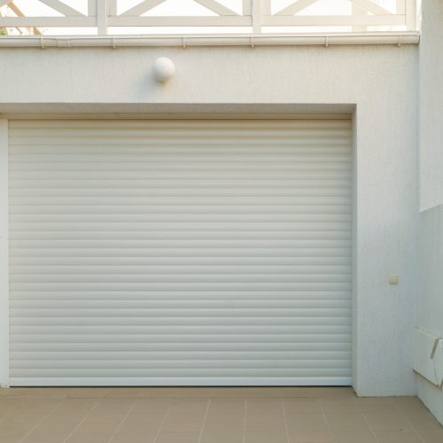White automatic garage doors are closed